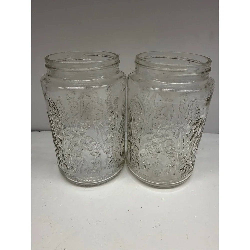Vintage Lilies of the Valley Clear Glass Jars Embossed Floral Canisters Set of 2